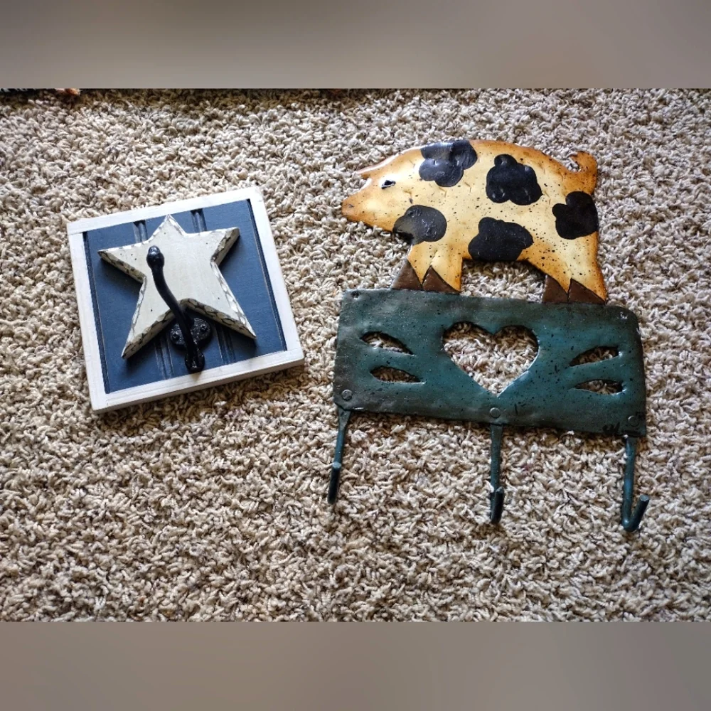 3 /$25 Two decorative wall coat hangers